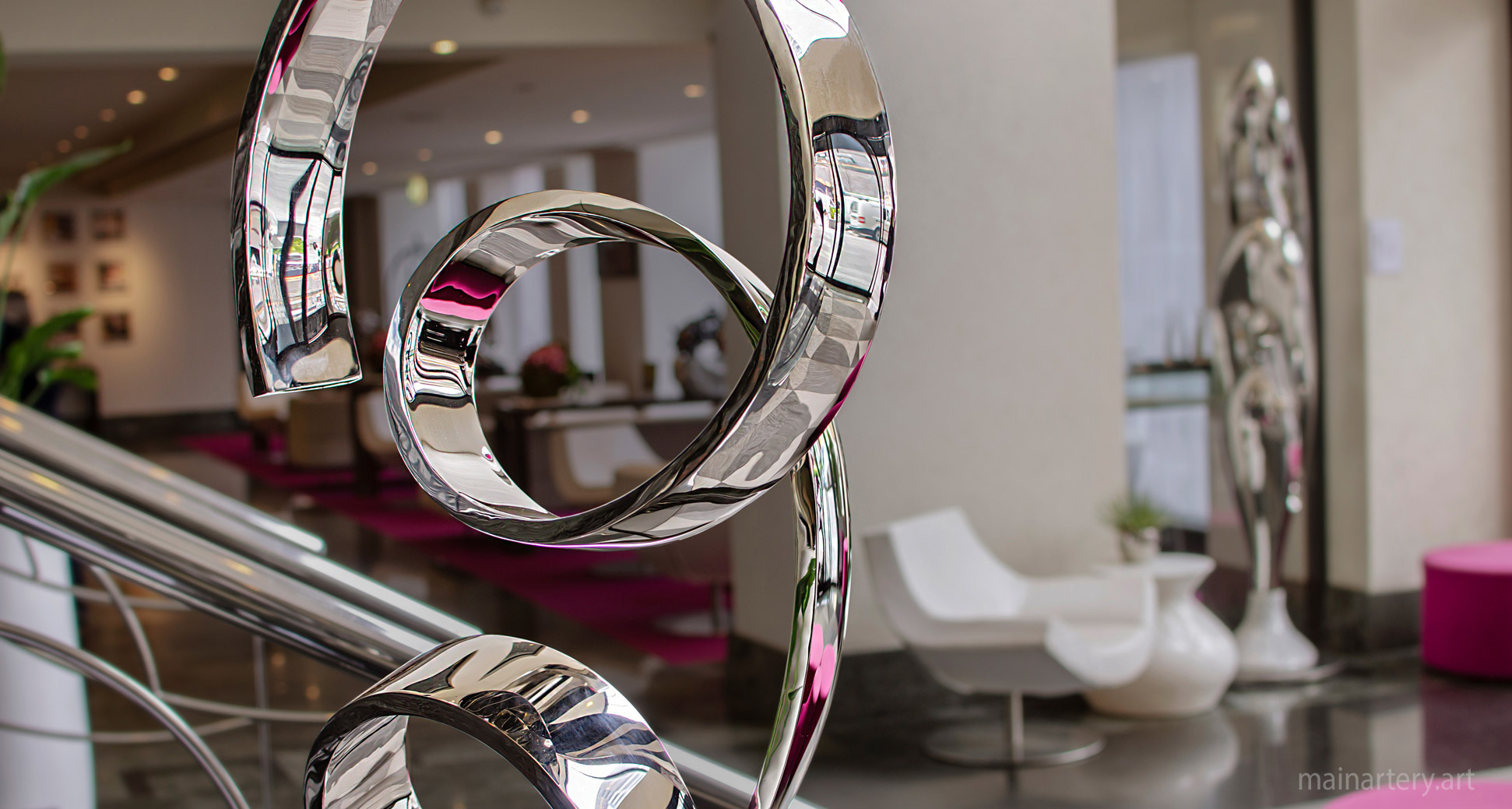 large abstract stainless foyer sculptures image