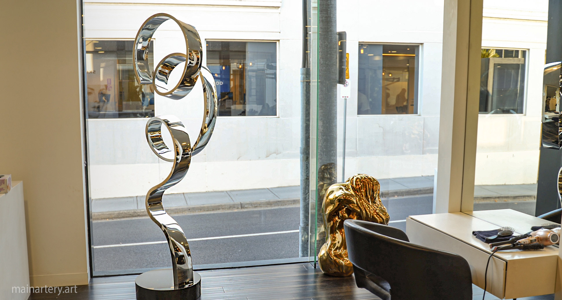 rent hire lease exclusive stainless steel sculpture corporate branding image