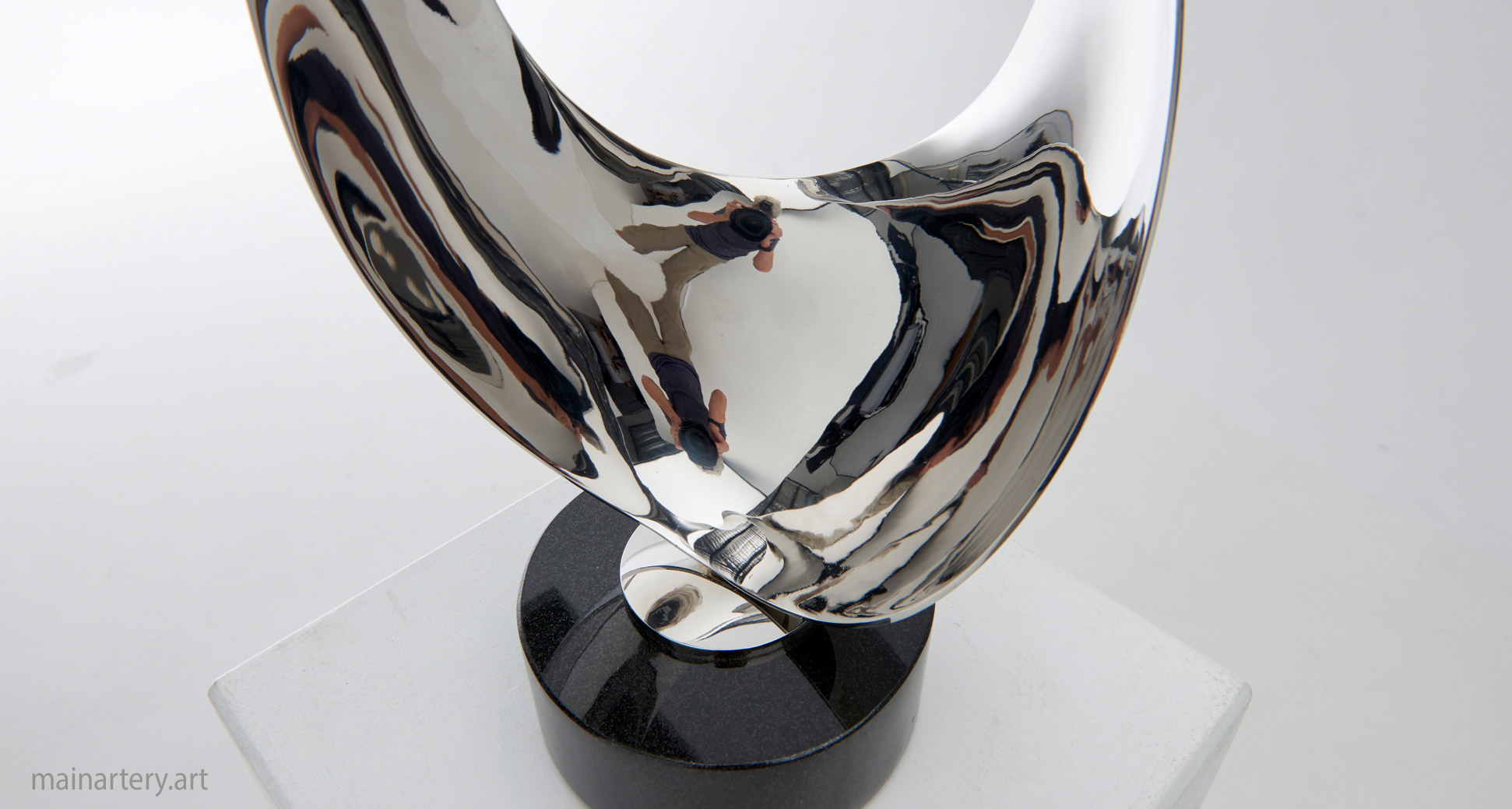 small mirror polished abstract sculpture image