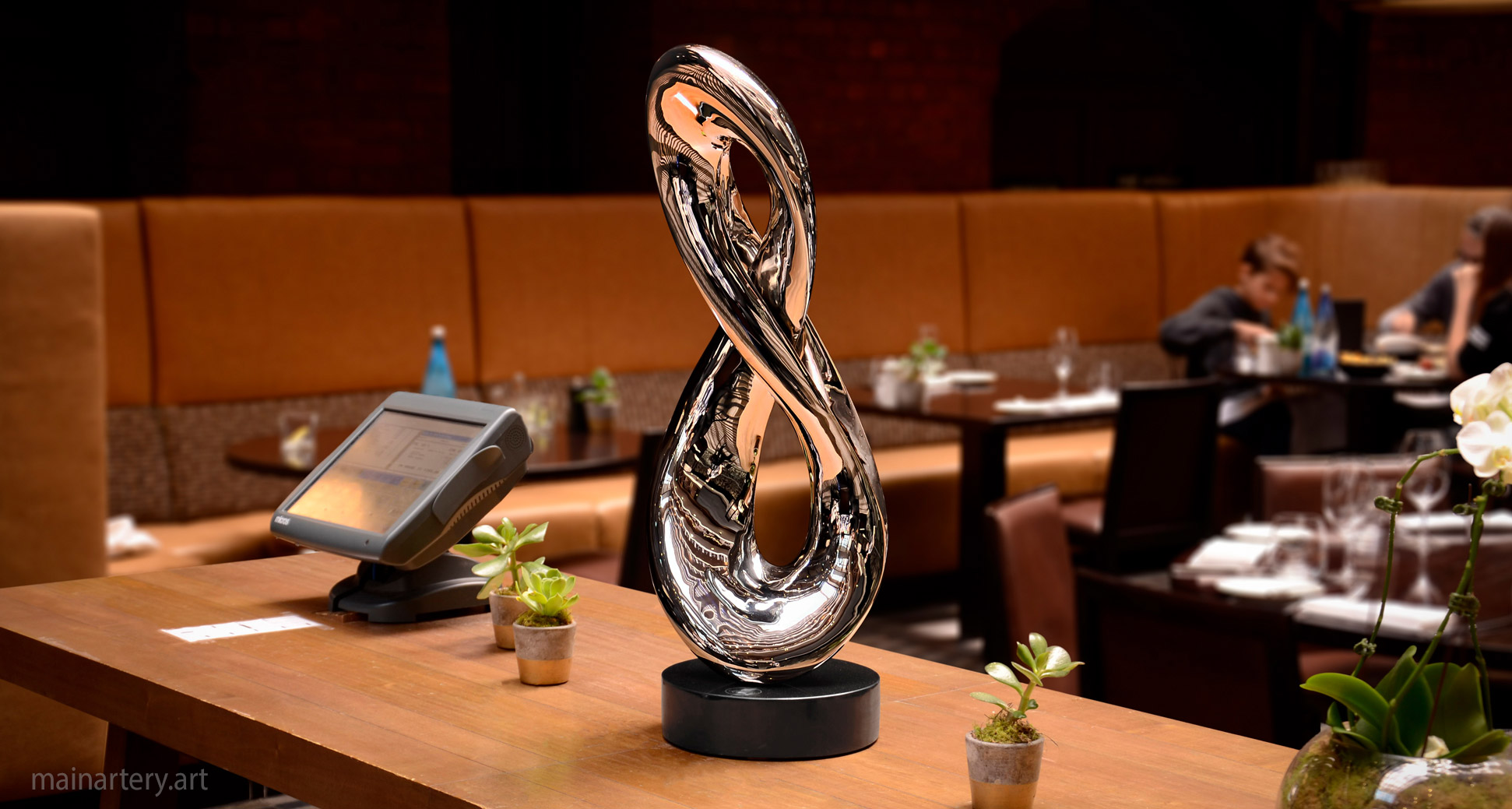 small stainless organic restaurant interior artwork image