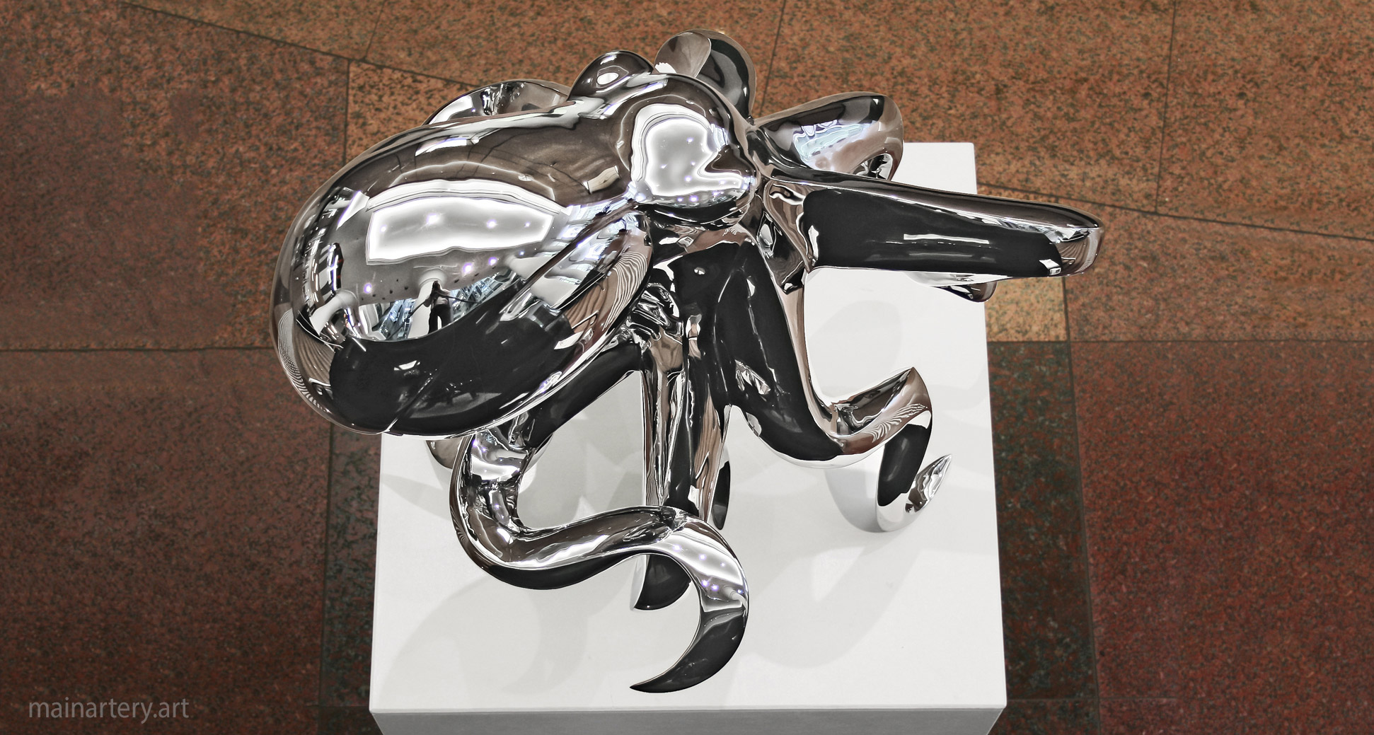 polished metal organic octopus interior sculpture image