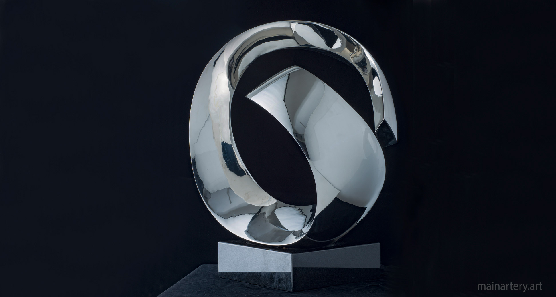 small metal abstract tied sculpture image