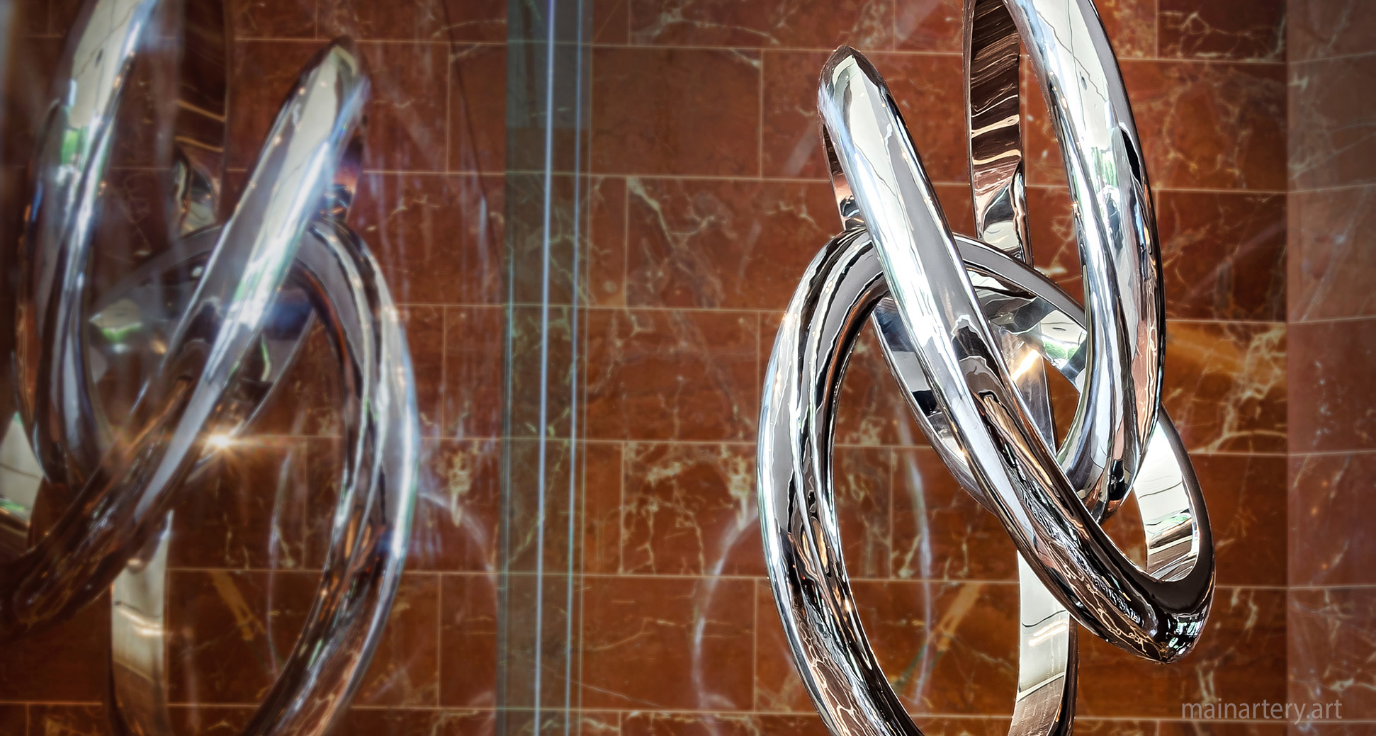 contemporary abstract hotel branding sculpture hire image