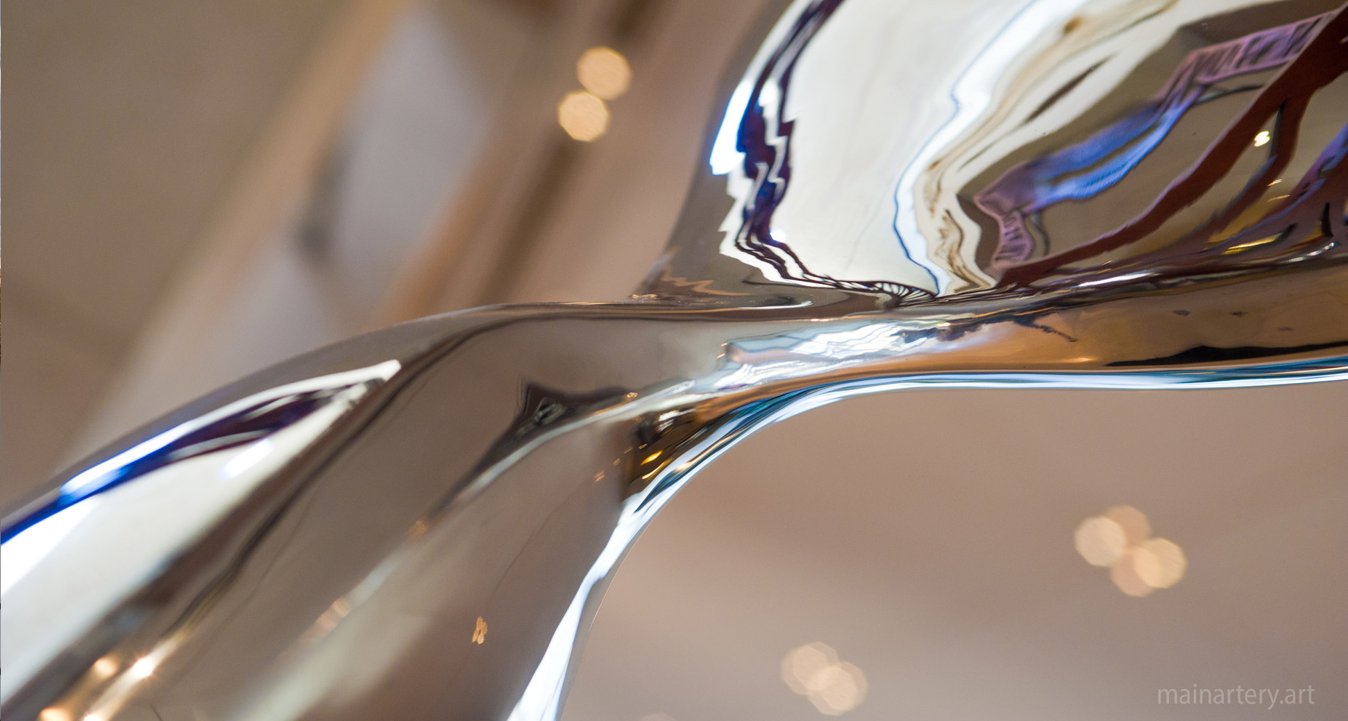 mirror polished modern morph sculpture detail image