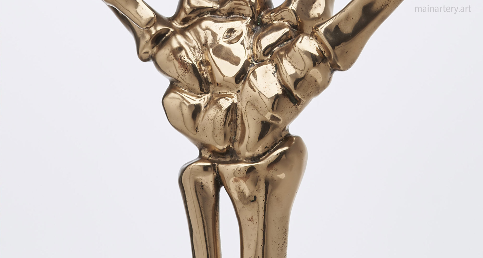 polished bronze bones wrist sculpture image