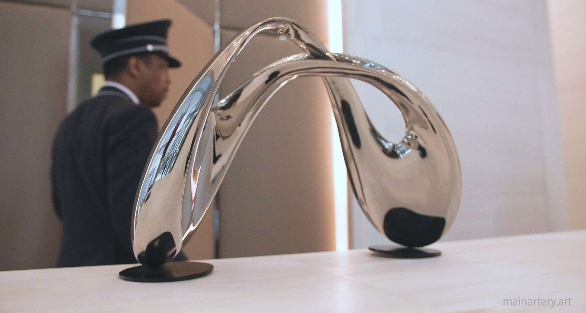 small stainless abstract feng shui sculpture image