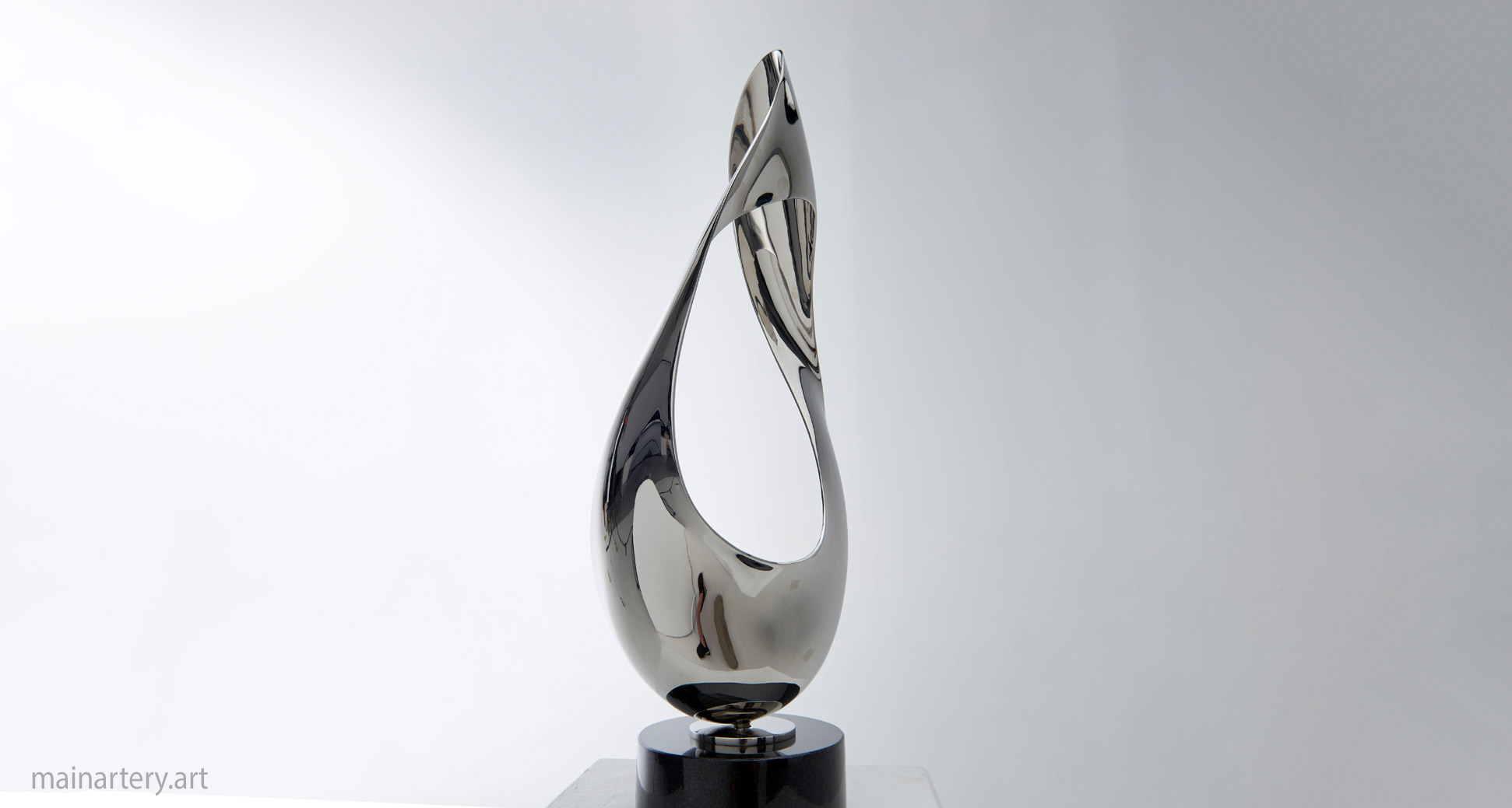 small stainless steel abstract interior sculpture image